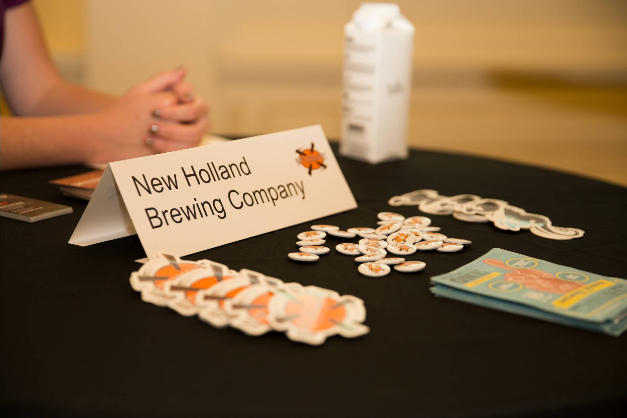 New Holland Brewing Company employment information on a table